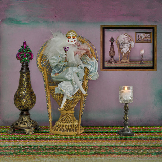 "Harlequin at Mardi Gras." Mardi Gras Harlequin Doll Sitting in a Peacock Chair Wall Art Print.